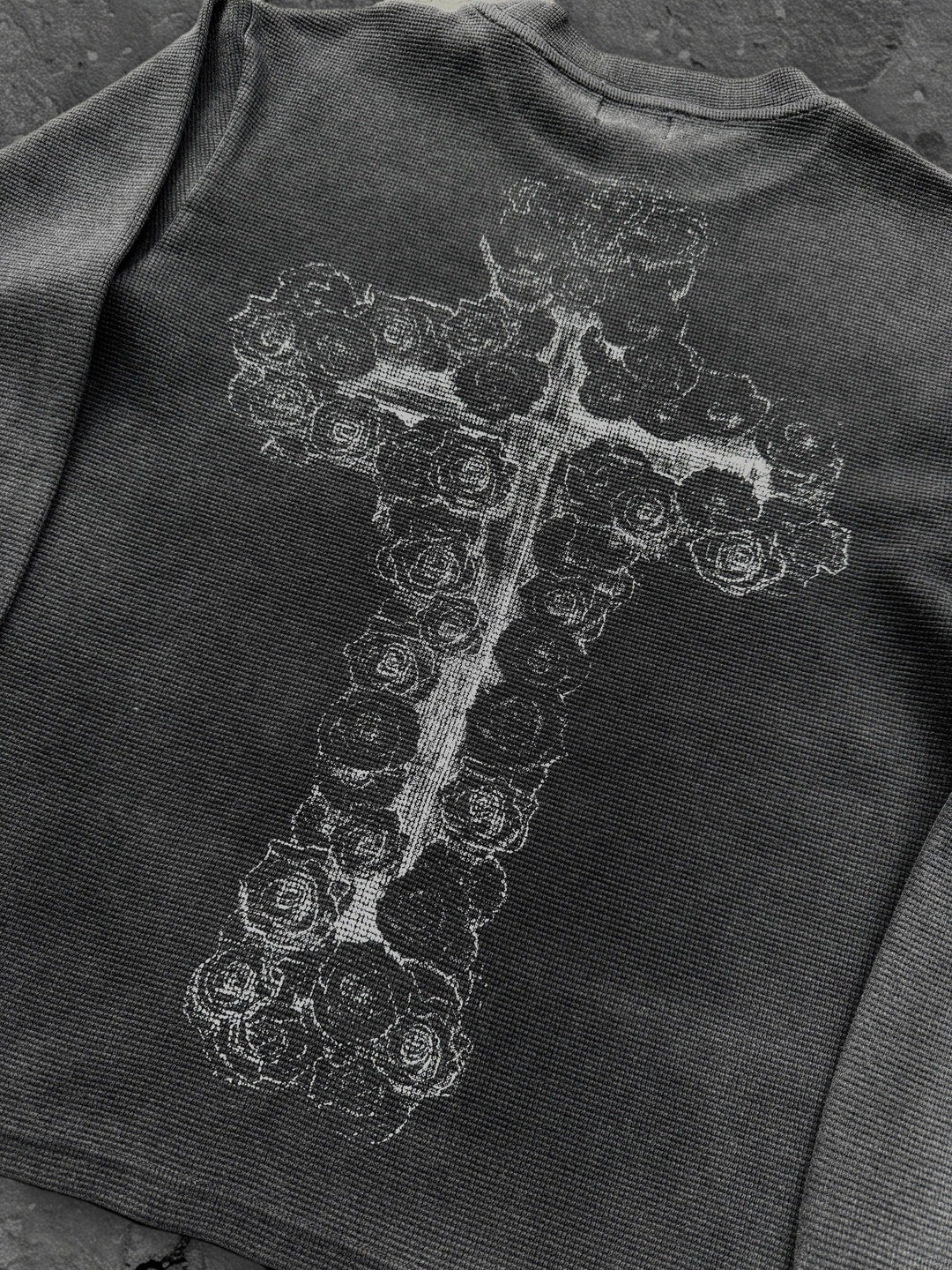 Dark graphic sweatshirt with contrasting front figure design