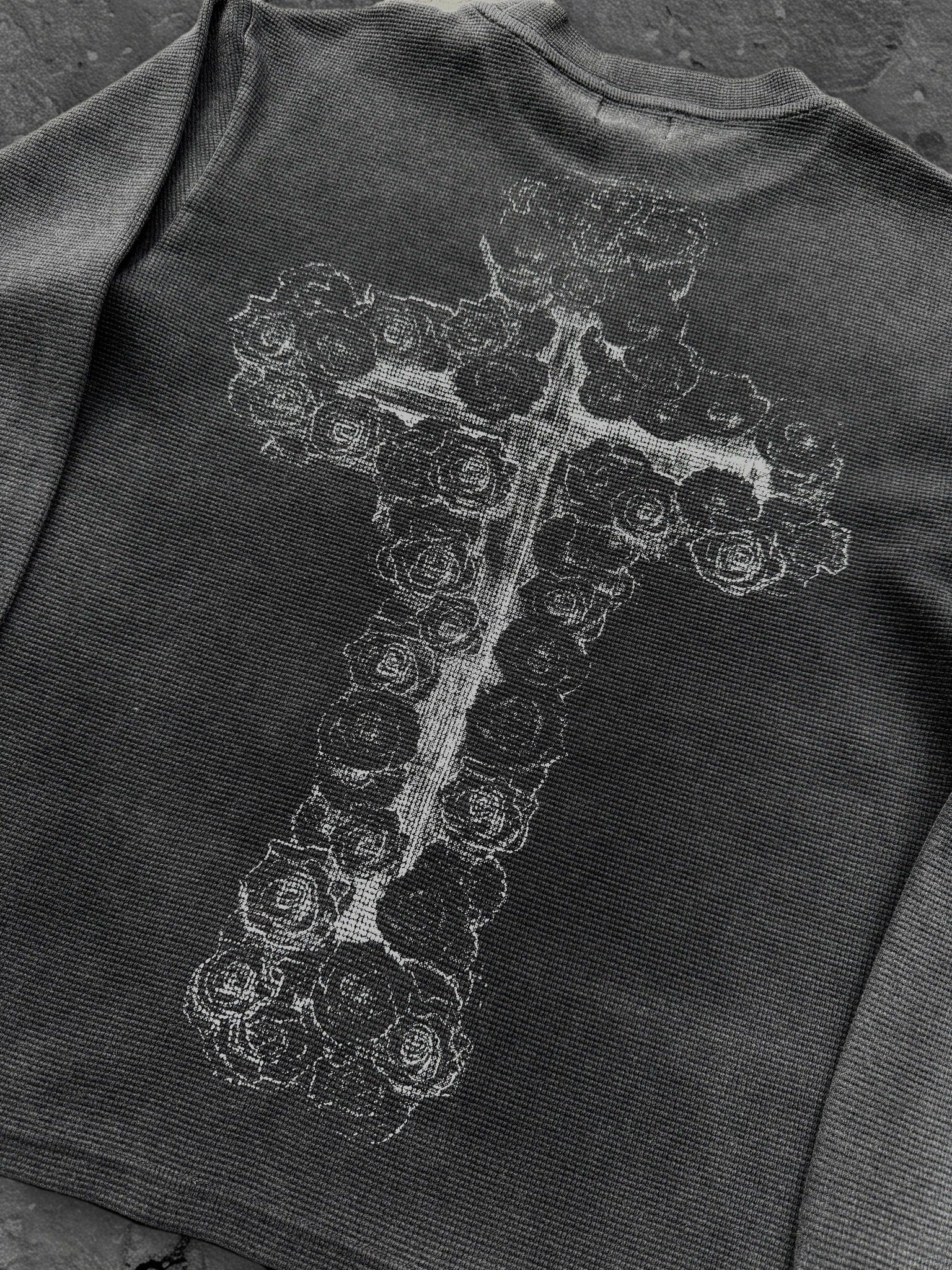 Dark graphic sweatshirt with contrasting front figure design