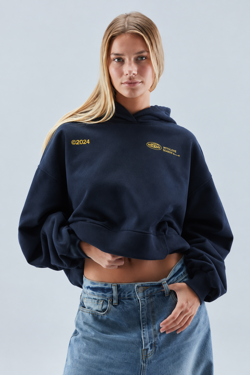 Women's oversized cropped hoodie with hood, long sleeves, ribbed trims and chest graphics