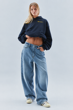 Women's oversized cropped hoodie with hood, long sleeves, ribbed trims and chest graphics