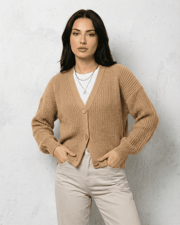 Women's textured V-neck cardigan with pearl-style trim and buttons