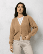 Women's textured V-neck cardigan with pearl-style trim and buttons