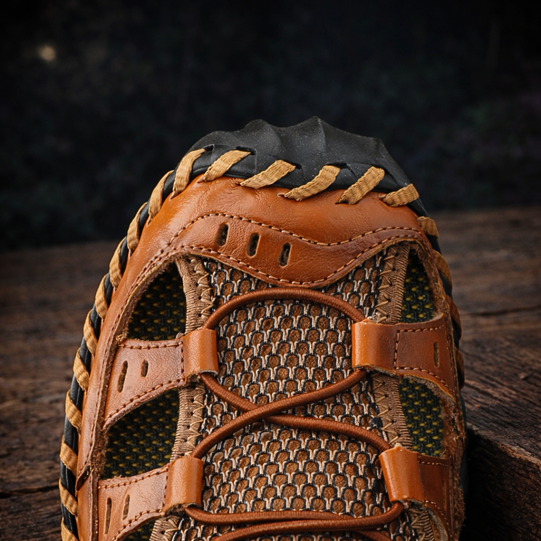 Men's outdoor walking sandal with velcro straps and mesh panels in black and green