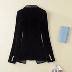 Women's textured blazer with contrast shawl lapels, long sleeves, buttons and flap pockets