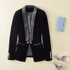 Women's textured blazer with contrast shawl lapels, long sleeves, buttons and flap pockets