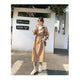 Women's long double breasted belted trench coat