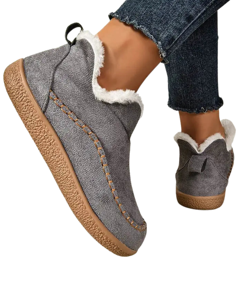 Women's ankle boots with faux fur trim and moccasin stitching