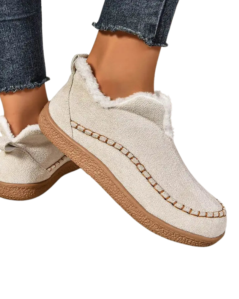 Women's ankle boots with faux fur trim and moccasin stitching