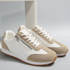 Women's lace-up trainers with contrast panels and treaded soles