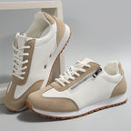 Women's lace-up trainers with contrast panels and treaded soles