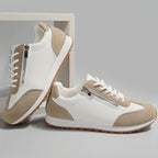 Women's lace-up trainers with contrast panels and treaded soles