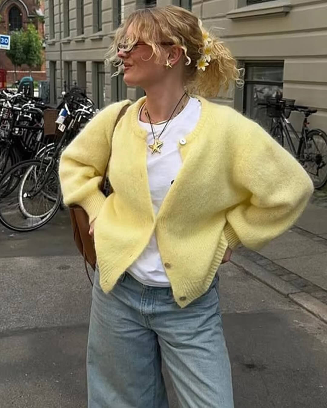 Women's fuzzy knit cardigan with crew neckline, button front and long sleeves