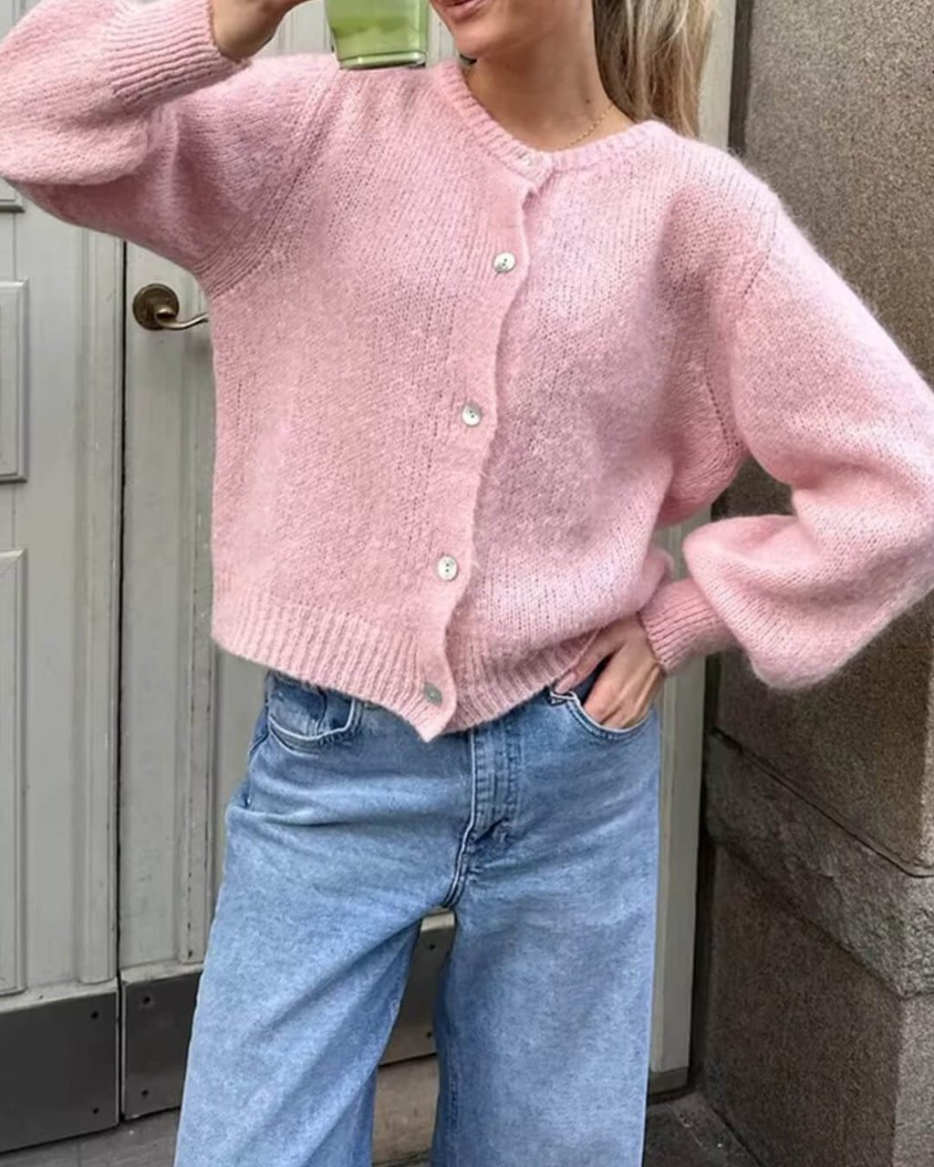 Women's fuzzy knit cardigan with crew neckline, button front and long sleeves