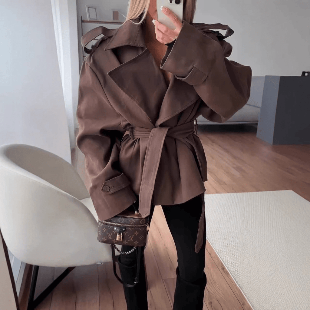 Women's cropped belted trench coat with wide lapels and long sleeves