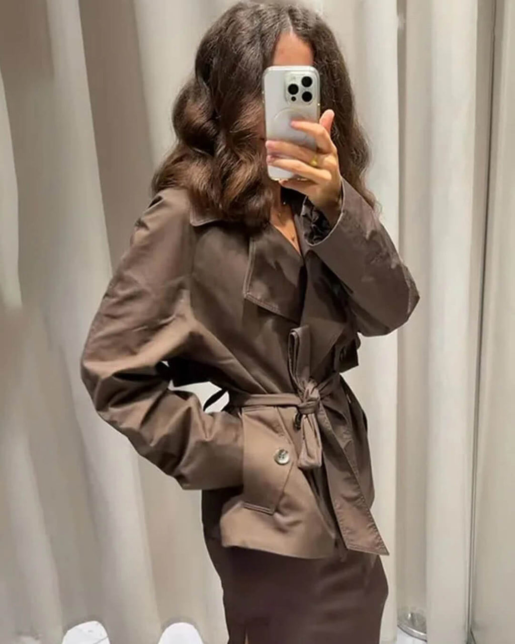 Women's short belted trench coat with wide lapels