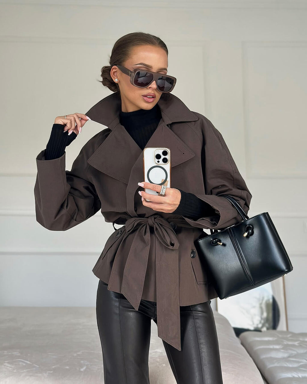 Women's short belted trench coat with wide lapels