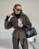 Women's short belted trench coat with wide lapels
