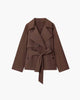 Women's short belted trench coat with wide lapels