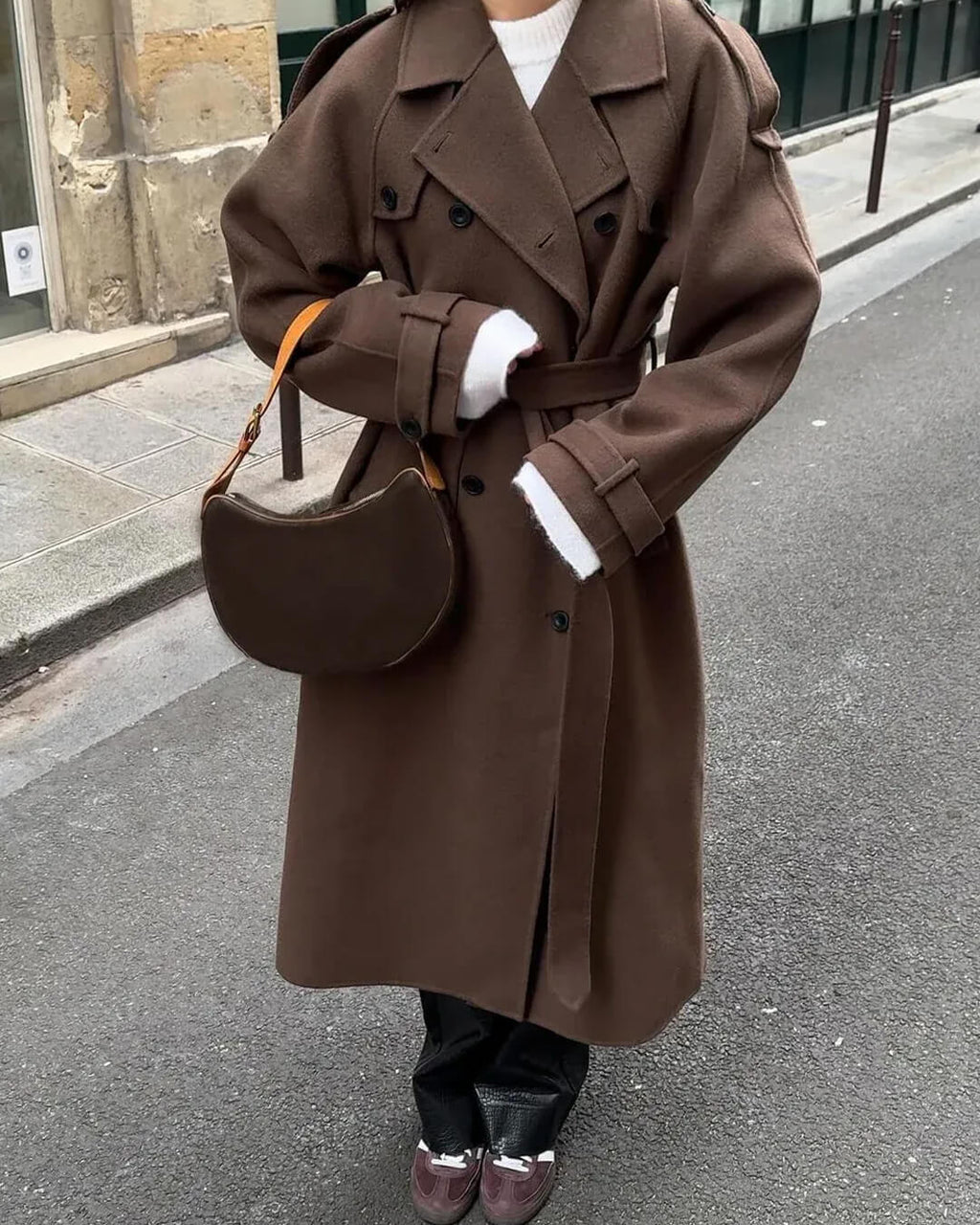 Women's long belted double-breasted coat with notched lapels