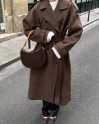 Women's long belted double-breasted coat with notched lapels