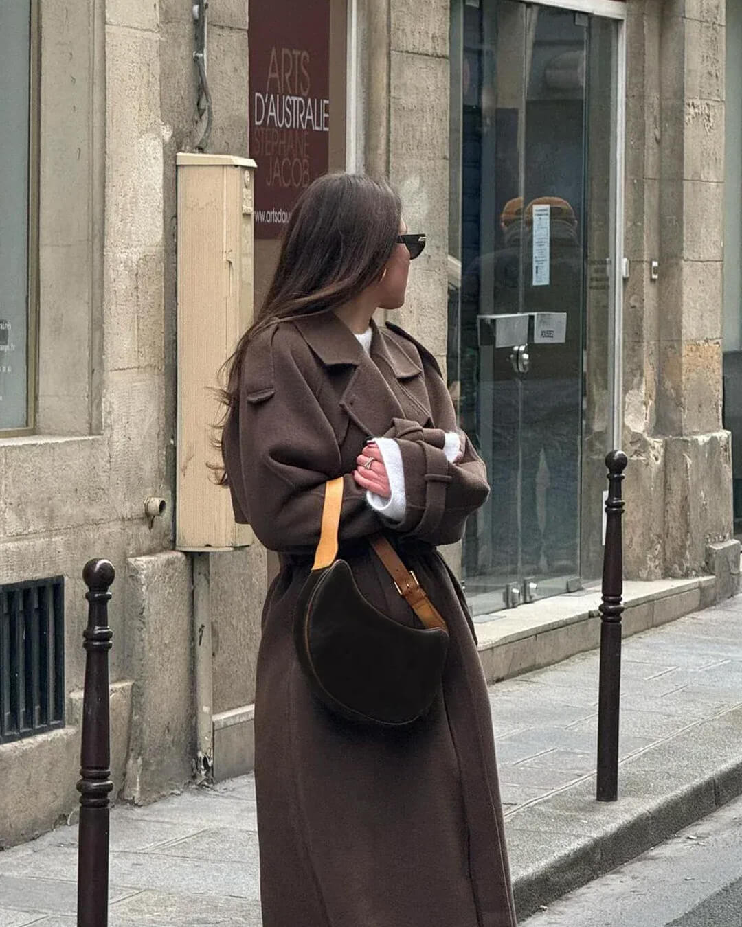 Women's long belted double-breasted coat with notched lapels