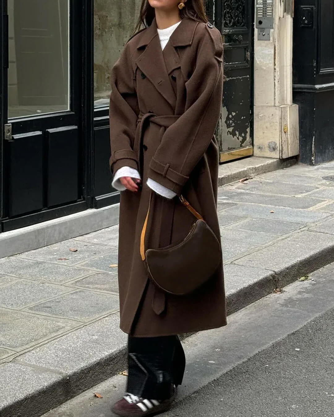 Women's long belted double-breasted coat with notched lapels