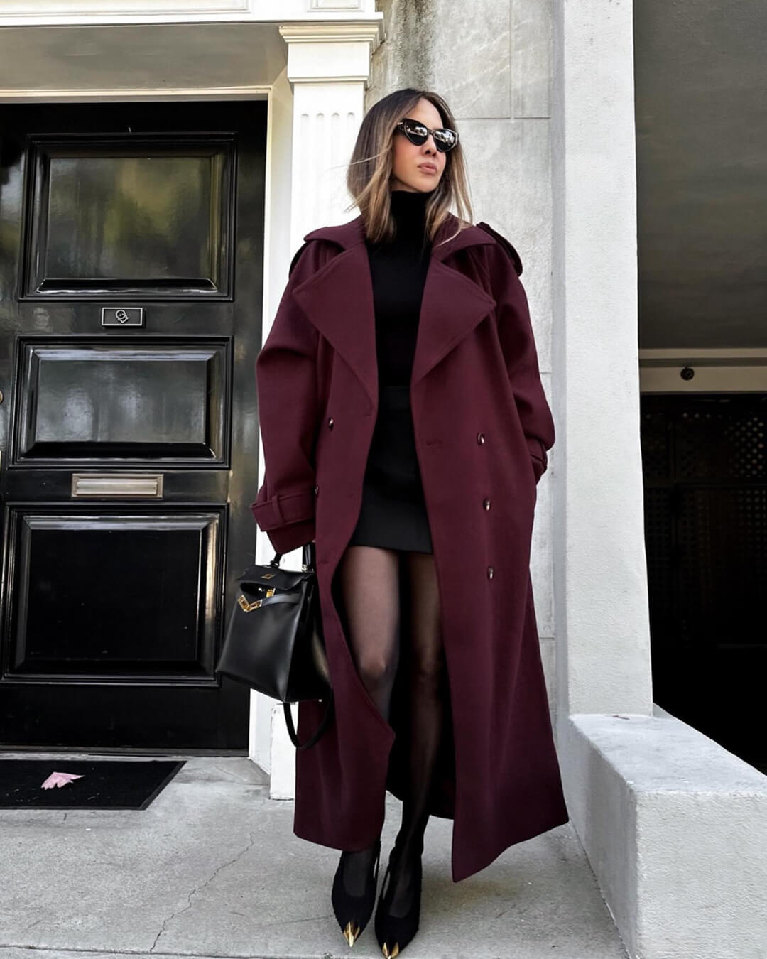 Women's long belted double-breasted coat with notched lapels
