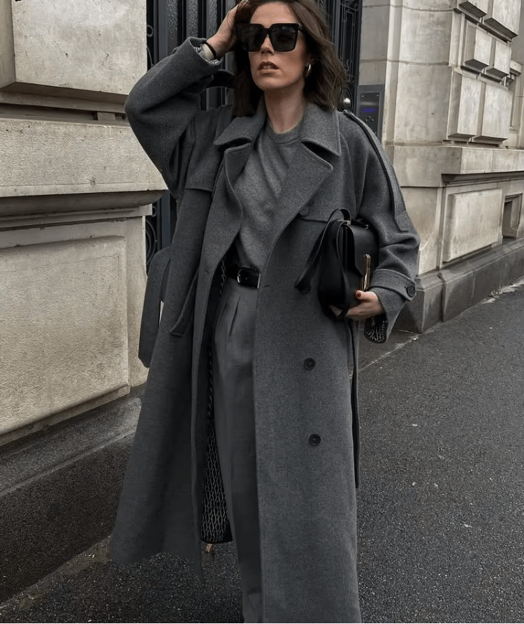 Women's long belted double-breasted coat with notched lapels