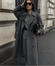 Women's long belted double-breasted coat with notched lapels
