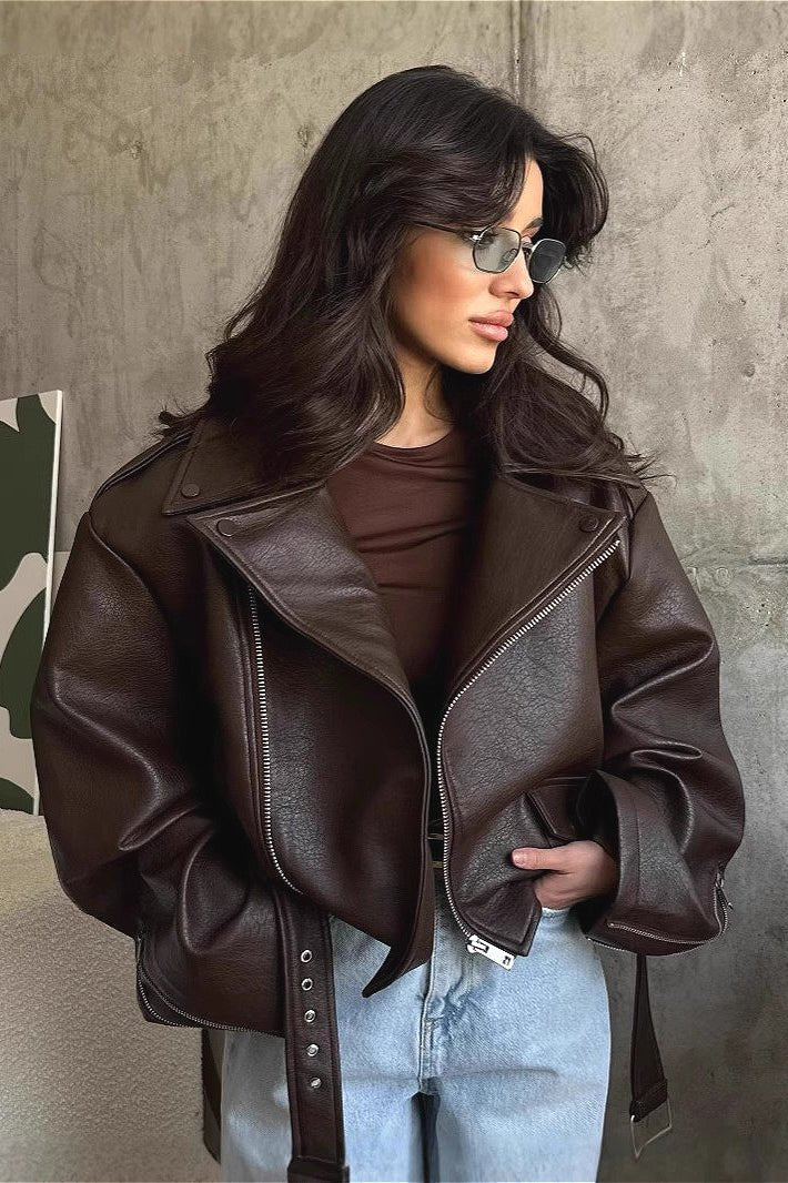 Women's dark brown biker jacket with lapels, diagonal zips and belted waist