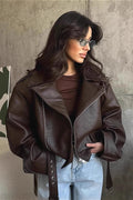 Women's dark brown biker jacket with lapels, diagonal zips and belted waist