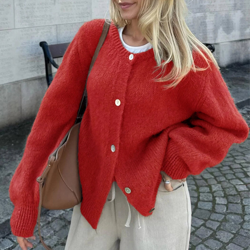 Women's fuzzy knit cardigan with crew neckline, button front and long sleeves