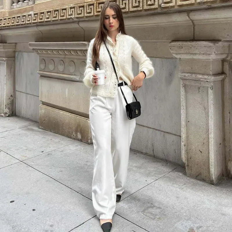 Women's white knit cardigan with lace front panels and long sleeves