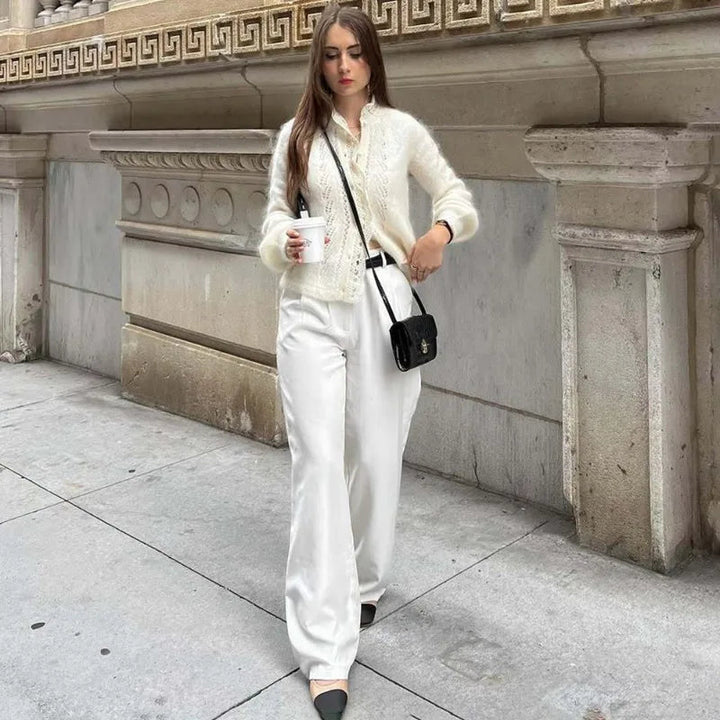 Women's white knit cardigan with lace front panels and long sleeves