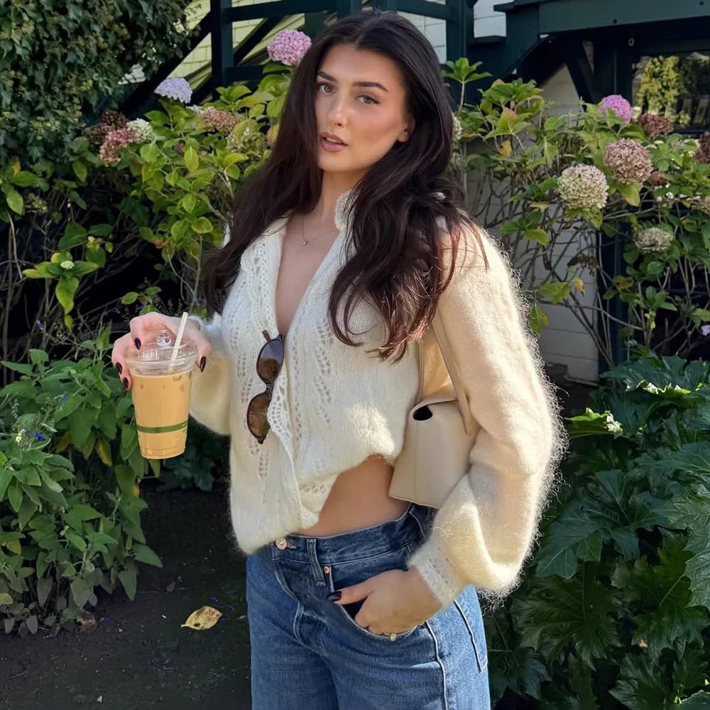 Women's white knit cardigan with lace front panels and long sleeves
