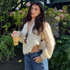 Women's white knit cardigan with lace front panels and long sleeves