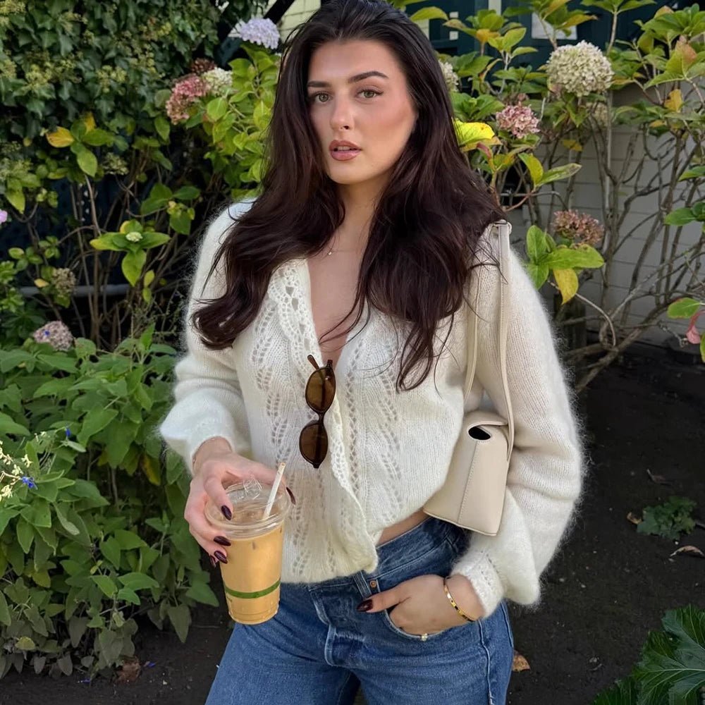 Women's white knit cardigan with lace front panels and long sleeves