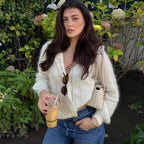 Women's white knit cardigan with lace front panels and long sleeves
