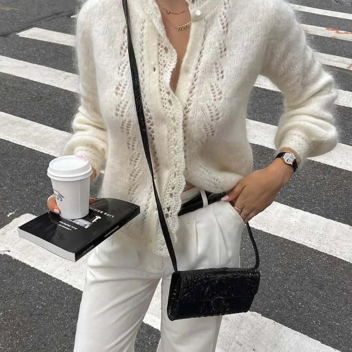 Women's white knit cardigan with lace front panels and long sleeves