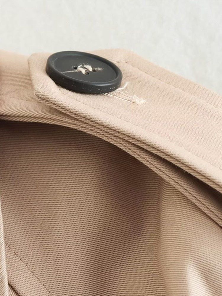 Women's beige cropped trench jacket with belt and long sleeves