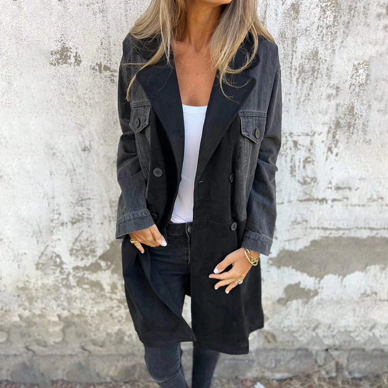 Women's mid-length trench coat with contrasting denim-look sleeves, lapel collar and button front