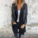 Women's mid-length trench coat with contrasting denim-look sleeves, lapel collar and button front