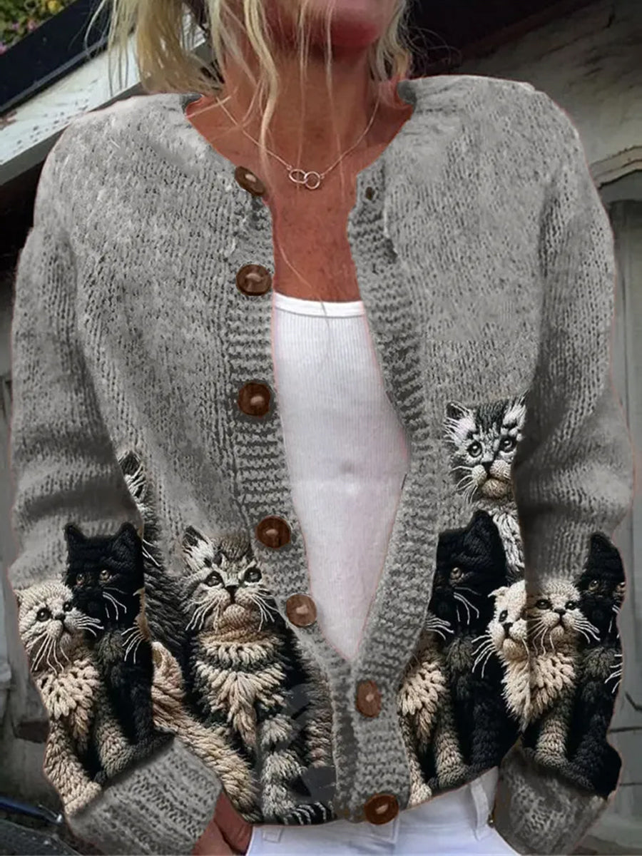 Women's button-front cardigan with a repeated cat print and long sleeves