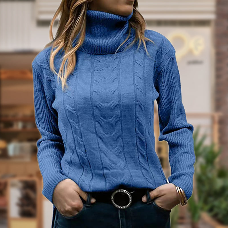 Women's cable knit turtleneck sweater with long sleeves and ribbed trims