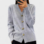 Women's V-neck button cardigan with long sleeves and front pockets