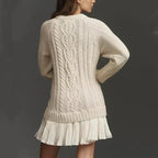 Women's cable knit mini dress with long sleeves and pleated lower skirt