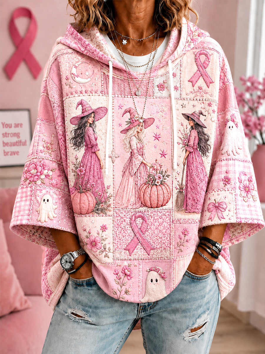 Women's pink hooded top with witches, ghosts, pumpkins and ribbon print