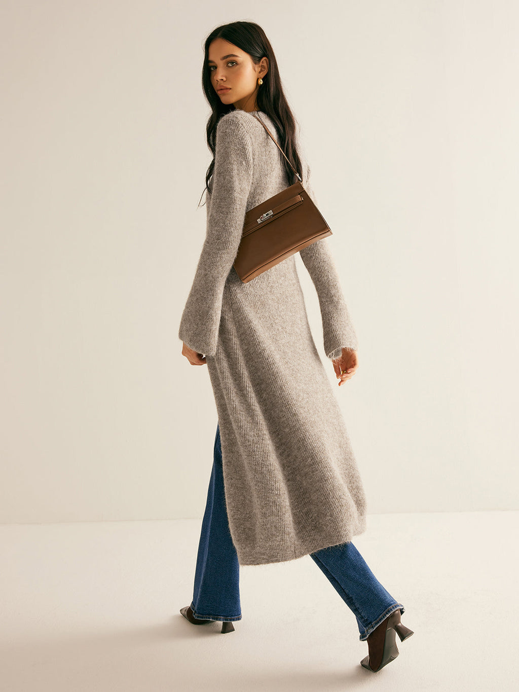 Women's long V-neck button front knit cardigan with flared cuffs
