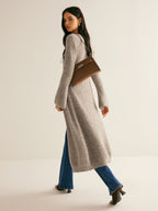 Women's long V-neck button front knit cardigan with flared cuffs