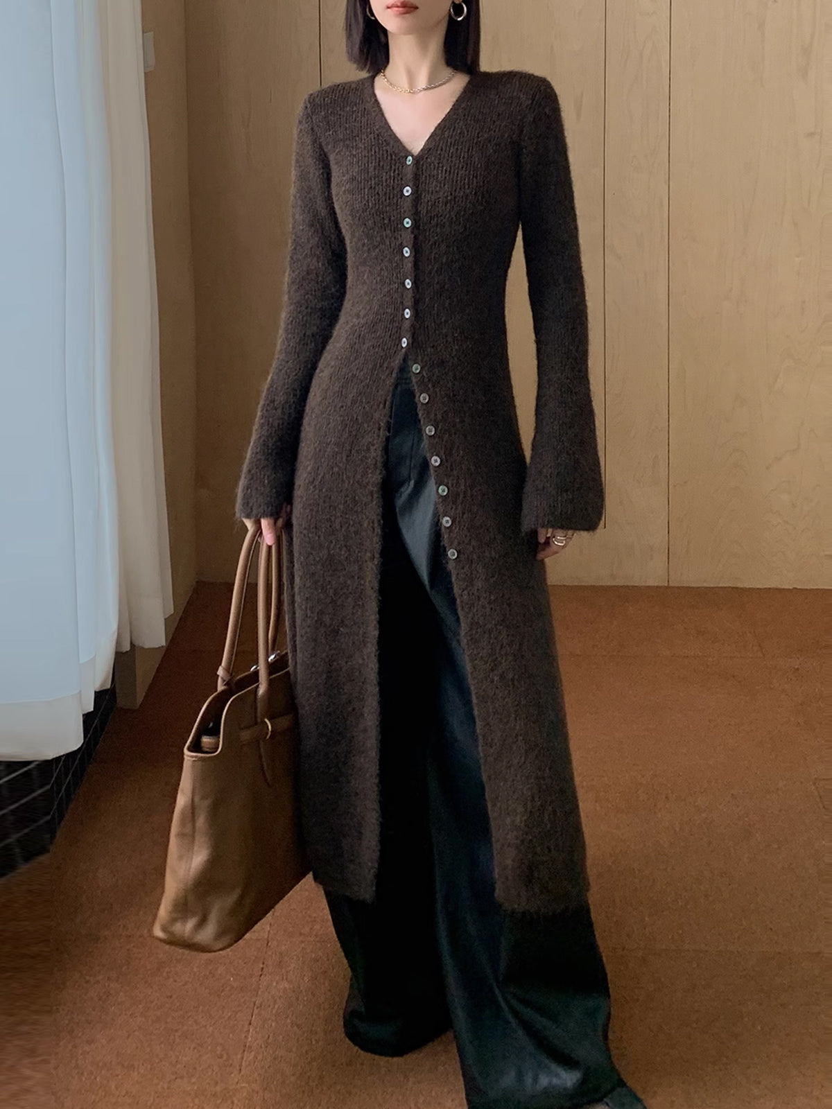 Women's long V-neck button front knit cardigan with flared cuffs